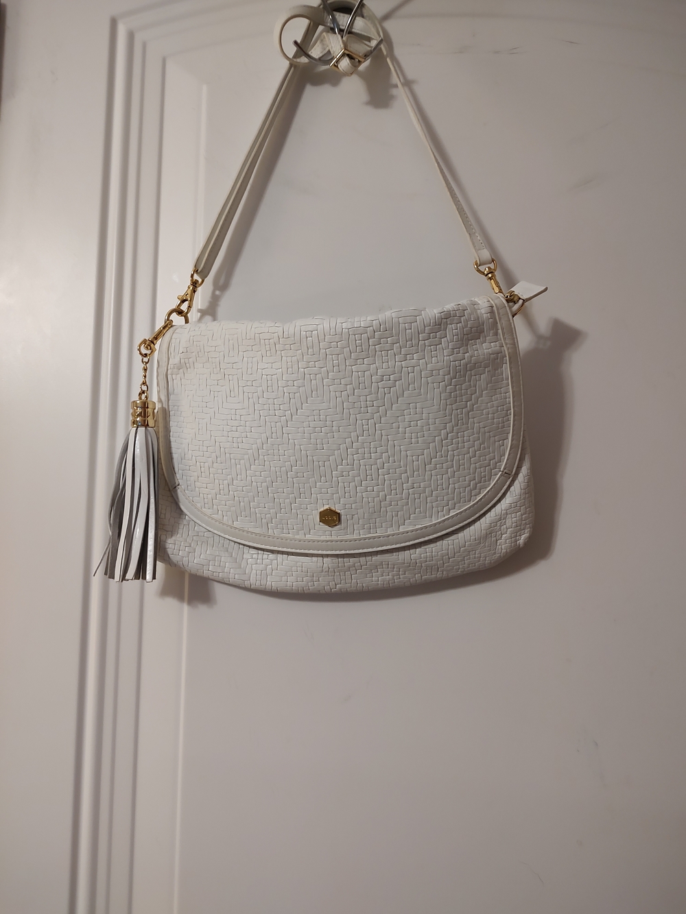 Lodis White Quilted Crossbody with Tassel Accent